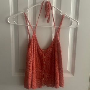 Tank top that is a size small and is red/orange and is Lily White brand.